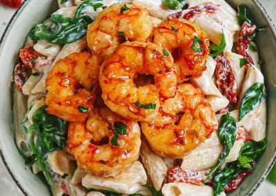 Sun-Dried Tomato and Spinach Pasta with Spicy Honey Shrimps
