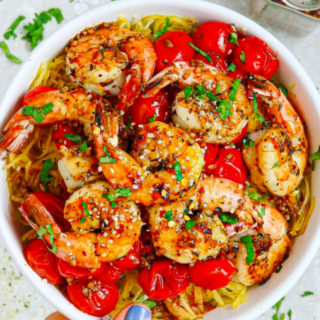 Italian Seasoned Shrimp and Spaghetti Squash with Balsamic and Garlic Roasted Tomatoes in a bowl