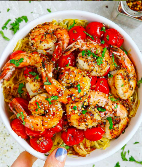 Italian Seasoned Shrimp and Spaghetti Squash with Balsamic and Garlic Roasted Tomatoes in a bowl