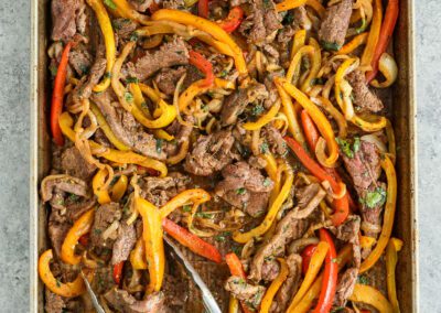 Sheet Pan Steak Fajitas with Avocado Crema